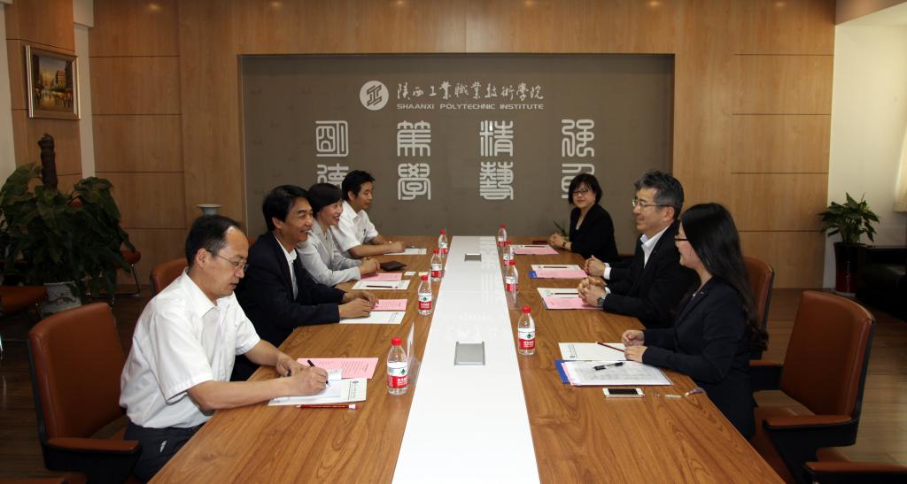 学院领导天博b综合体育app官网见欧姆龙本社董事吉川净一行